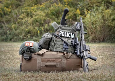 Photo-luminescent K9 and POLICIA IR patches on SWAT gear