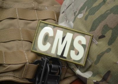 Multicam fabric patch with Photoluminescent Letters CMS