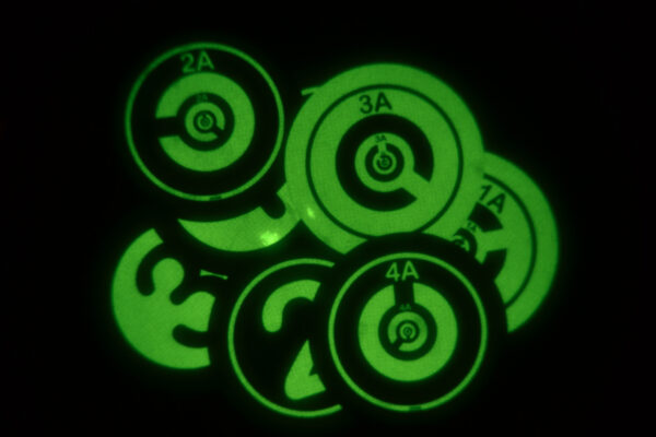 Night vision glow discs for training in the dark.